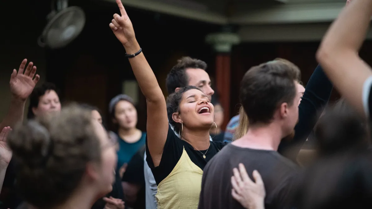 Students worshipping together on campus